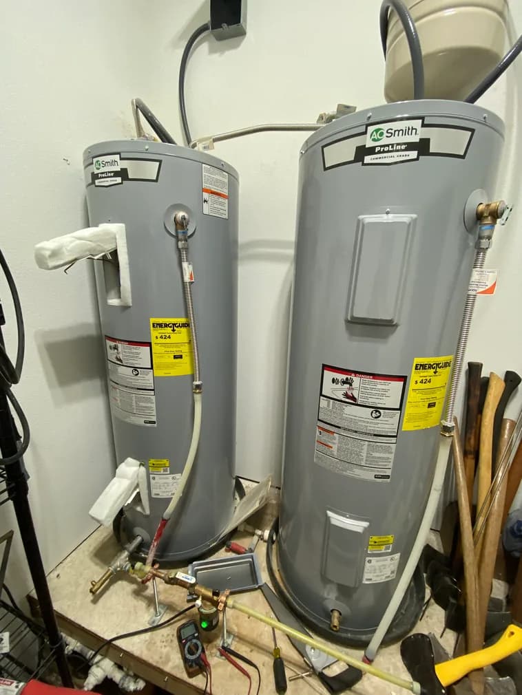 Two AO Smith ProLine water heaters installed side by side