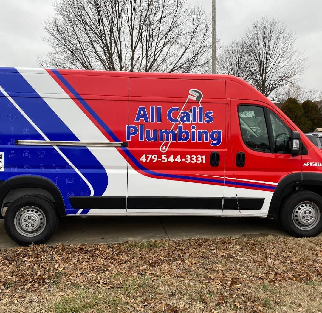 All Calls Plumbing branded service van parked in a Northwest Arkansas driveway