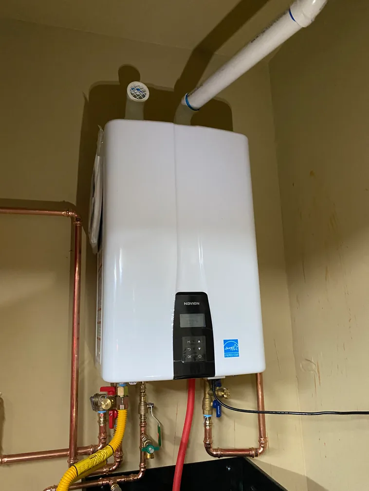 Navien tankless water heater installed with copper and PEX piping
